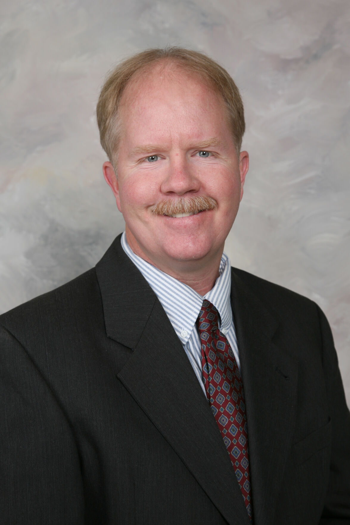 E. John Wipfler III, MD